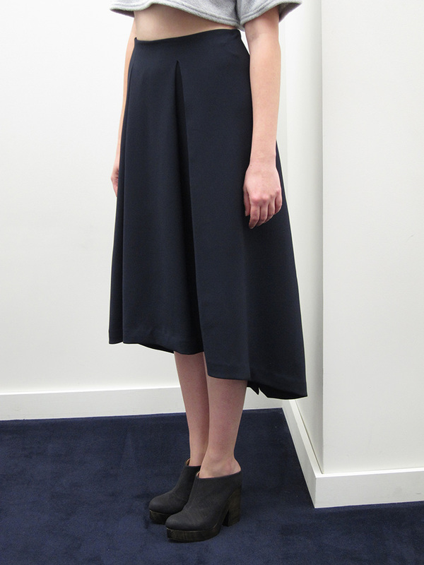 KAAREM Piece of Ring Pleated Midi Skirt KAAREM Piece of Ring Pleated Midi Skirt