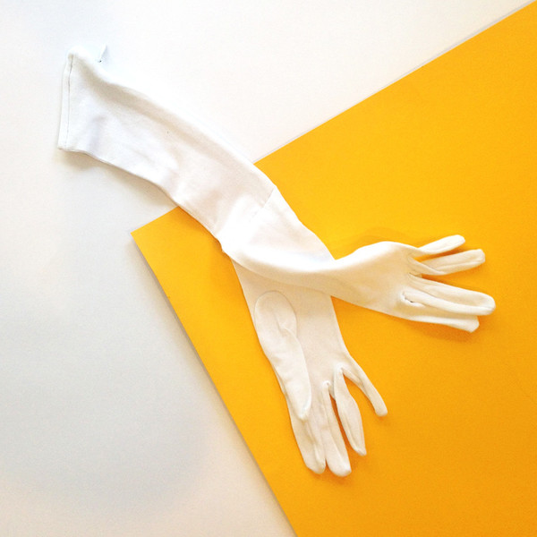 Slow and Steady Wins the Race Glove Clutch in White Slow and Steady Wins the Race Glove Clutch in White