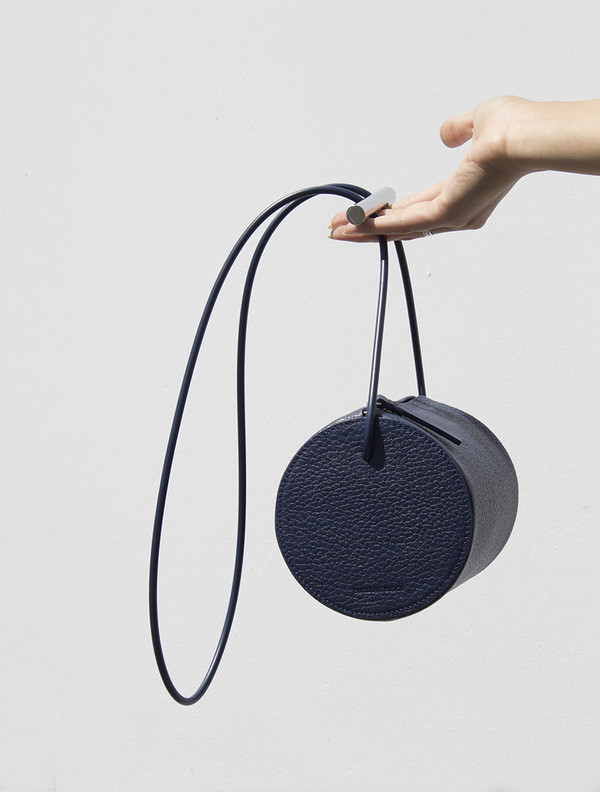 Building Block Cylinder Sling in Navy Building Block Cylinder Sling in Navy