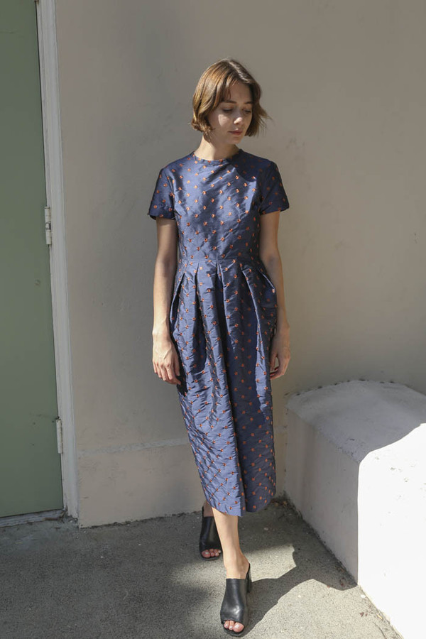 Nikki Chasin Marta Pleat Dress in Navy/Ochre Nikki Chasin Marta Pleat Dress in Navy/Ochre