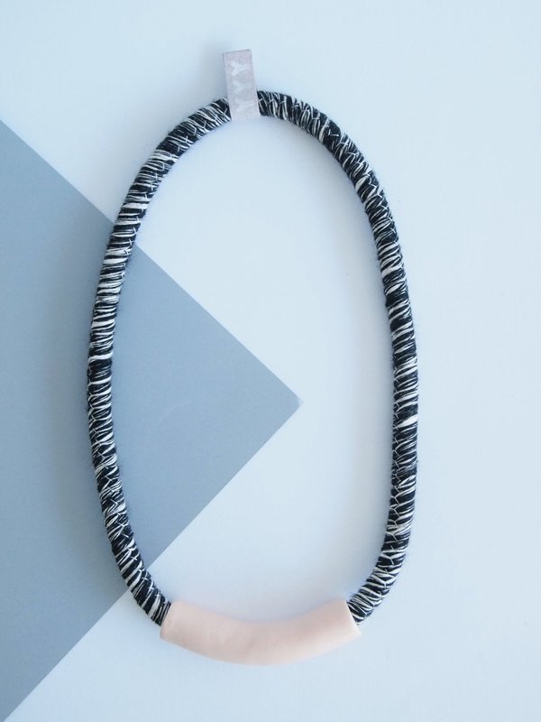 YYY short peach tube necklace on variegated cord YYY short peach tube necklace on variegated cord