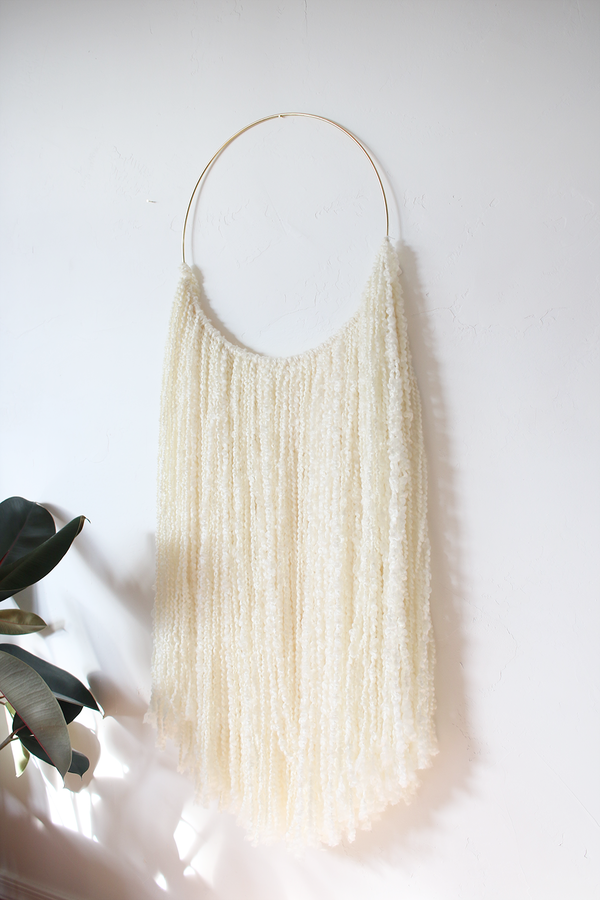 Sonadora White Fiber and Polished Brass Wall Hanging Sonadora White Fiber and Polished Brass Wall Hanging
