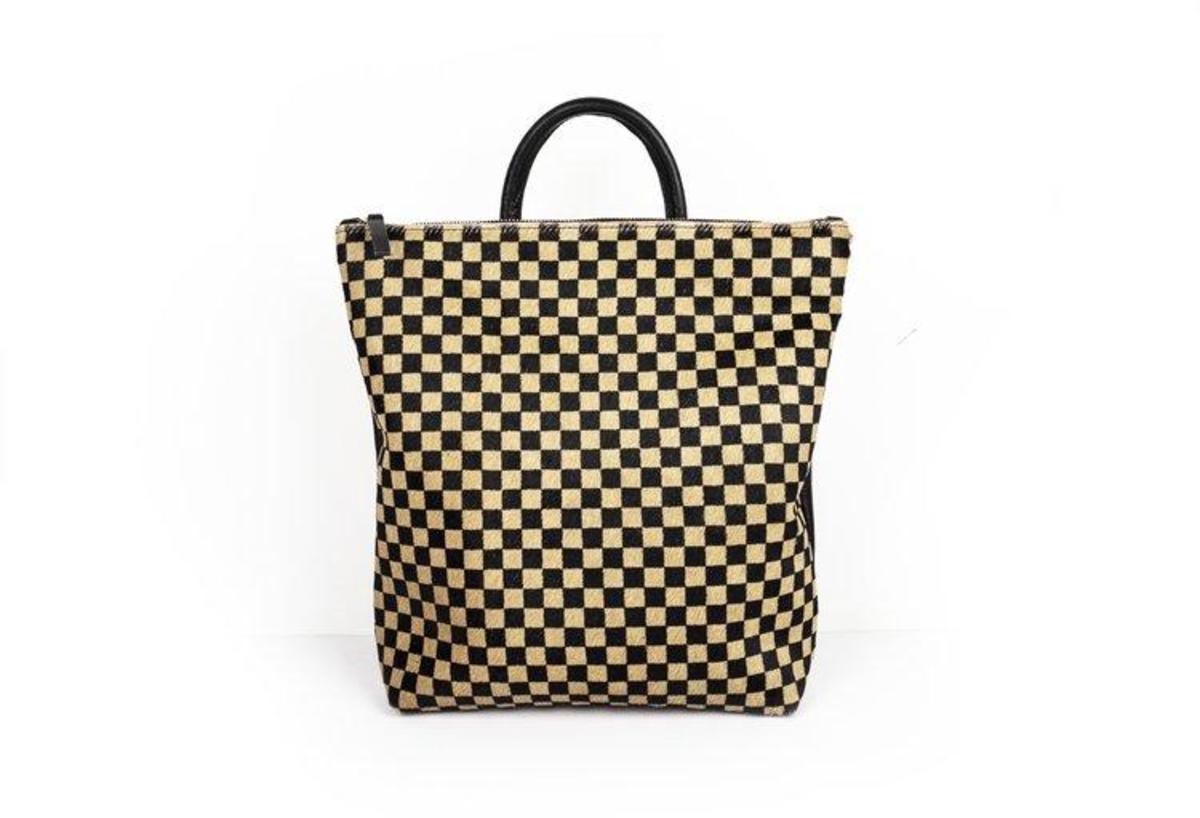 white and tan checkered purse